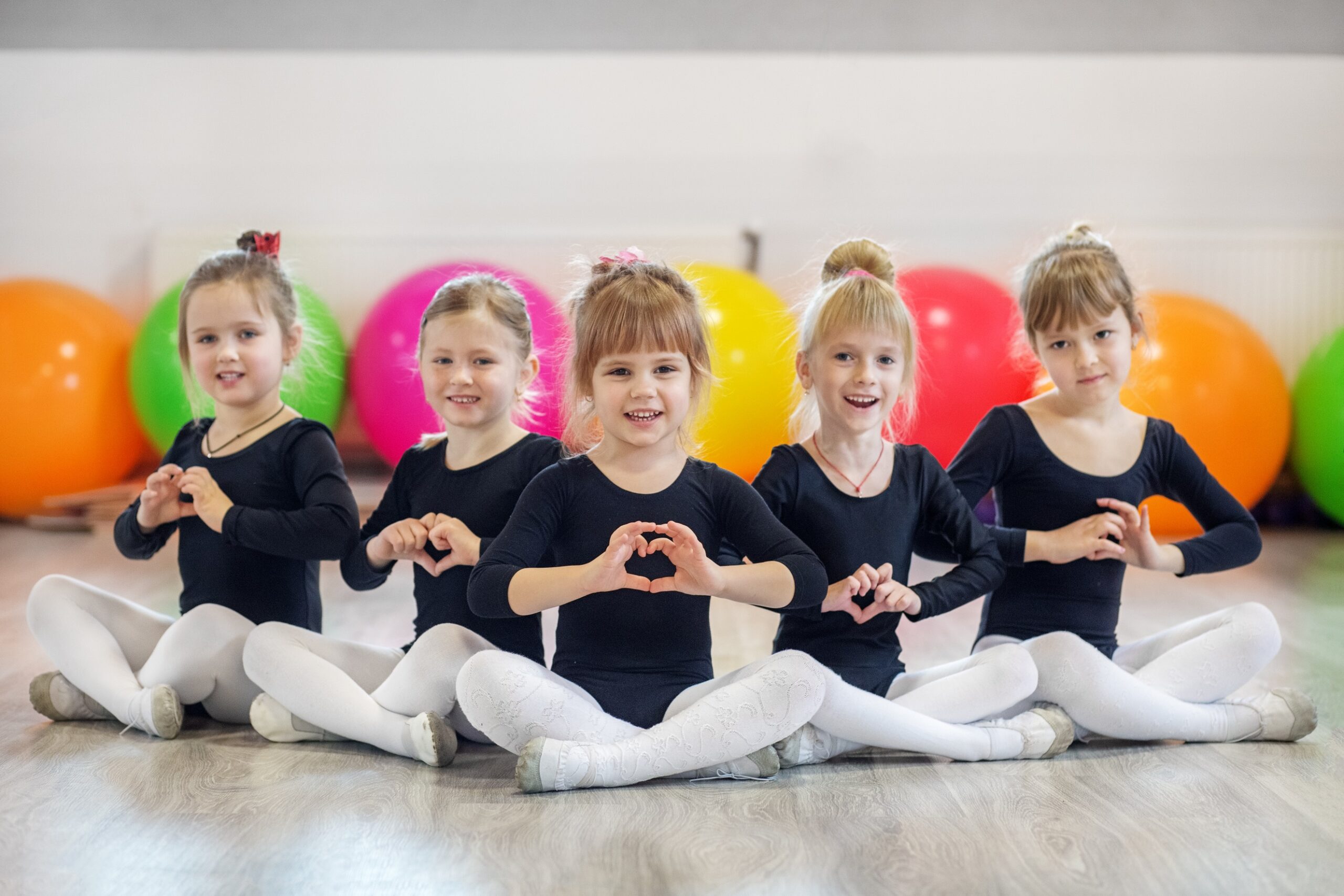 A group of preschoolers in dance classes. The concept of sport, education, childhood, hobbies and dance